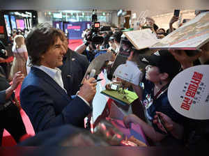 American actor Tom Cruise meets fans during a red carpet event for the film 'Mission Impossible – Dead Reckoning Part One' in Seoul on June 29, 2023. (Photo by JUNG YEON-JE / AFP)