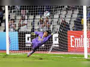 Bengaluru: India’s goalkeeper Gurpreet Singh Sandhu saves a penalty kick against...
