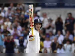 England's Harry Brook celebrates a century during the fourth day of the third As...
