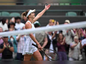 Ukraine's Elina Svitolina celebrates beating Belarus' Victoria Azarenka during their women's singles tennis match on the seventh day of the 2023 Wimbledon Championships at The All England Tennis Club in Wimbledon, southwest London, on July 9, 2023.  RESTRICTED TO EDITORIAL USE (Photo by Glyn KIRK / AFP) / RESTRICTED TO EDITORIAL USE