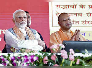Gorakhpur, July 07 (ANI): Prime Minister Narendra Modi with Uttar Pradesh Chief ...