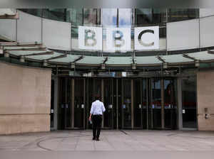 A person walks outside the BBC headquarters in London