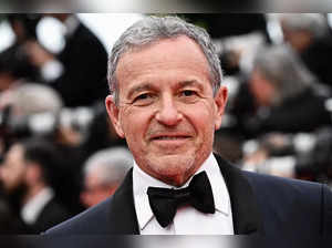 (FILES) CEO of The Walt Disney Company Bob Iger arrives for the screening of the film "Indiana Jones and the Dial of Destiny" during the 76th edition of the Cannes Film Festival in Cannes, southern France, on May 18, 2023. Disney announced July 12, 2023 that it extended Bob Iger's contract through December 31, 2026, giving the long-running chief executive two more years to lead the entertainment giant. (Photo by LOIC VENANCE / AFP)