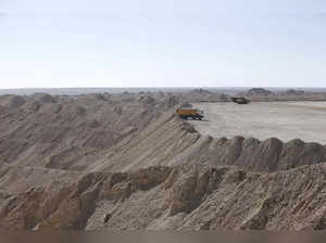 FILE PHOTO: A vehicle carries untreated phosphate after being dropped off on a mountain at a phosphate mine at Boucraa factory of the National Moroccan phosphate company (OCP) situated in the southern provinces