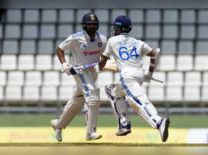 India's captain Rohit Sharma and Yashasvi JaiswalÂ build up a partnership agains...