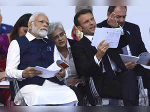 French President Emmanuel Macron talks to Indian Prime Minister Narendra Modi du....
