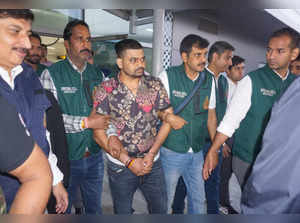 New Delhi: Gangster Deepak 'Boxer', a wanted fugitive in India, being brought fr...