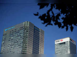 FILE PHOTO: HSBC and Barclays' buildings in Canary Wharf are seen on a clear morning in London