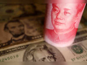 Illustration picture of U.S. Dollar and Chinese Yuan banknotes