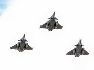 Paris, July 14 (ANI): Indian Air Force (IAF) Rafale fighter jets fly past  durin...