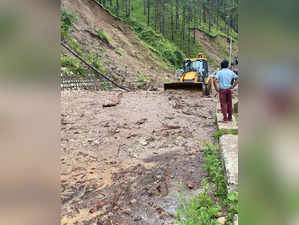 Uttarkashi: Debris being cleared from the Yamunotri National Highway after it go...
