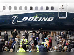 Boeing loses $149 million in Q2 as the plane maker is pushing ahead with production increases