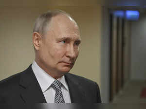 Russian President Vladimir Putin answers journalists' questions about the grain ...