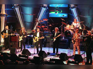 (FILES) The Eagles (from left:) Randy Meisner, Timothy Schmit, Glenn Frey, Don Felder, Joe Walsh, Don Henley and Bernie Leadon, appear together on stage after receiving their awards and being inducted into the Rock & Roll Hall of Fame, January 12, 1998 in New York.  Randy Meisner, a founding member of chart-topping rock band the Eagles, has died in Los Angeles at the age of 77, the group said July 27, 2023. (Photo by Timothy A. CLARY / AFP)