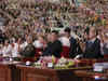 North Korean leader Kim shares center stage with Russian, Chinese delegates at military parade