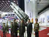 North Korea shows off drones and ballistic missiles at night-time parade
