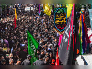Srinagar: Shia muslims participate in the 7th Muharram procession, in Srinagar. ...