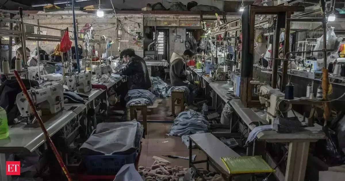 China factory activity shrinks for fourth straight month - The Economic ...