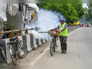 New Delhi, July 19 (ANI): A Municipal Corporation of Delhi (MCD) worker fumigate...