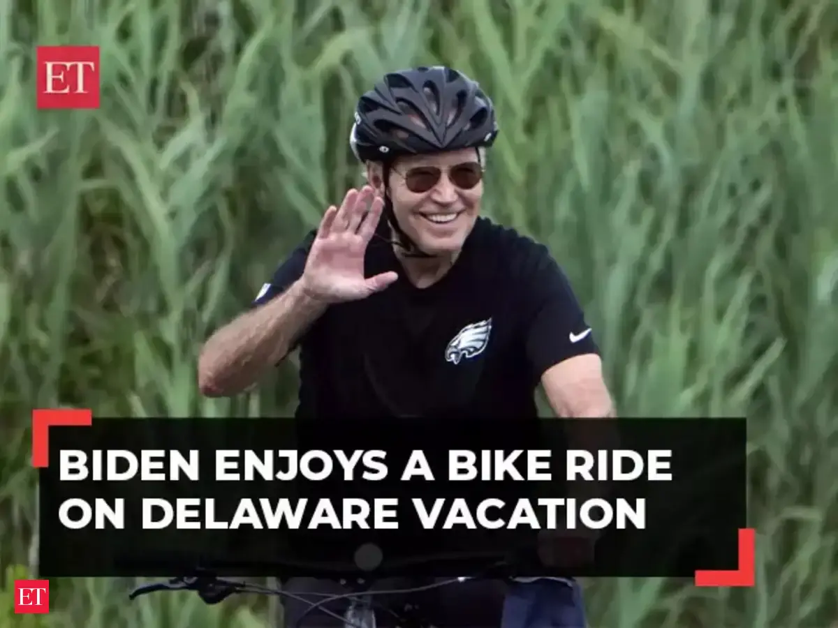 Joe Biden: US President Joe Biden enjoys a bike ride on delaware ...
