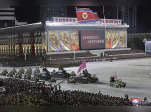 In this photo provided by the North Korean government, a military parade is held...