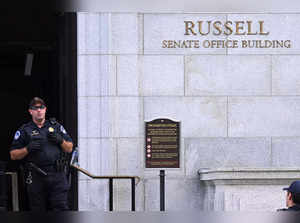 A US Capitol police officer stands outside the Russell Senate Office Building in Washington, DC, on August 2, 2023, after unconfirmed eports of an active shooter in the building near the US Capitol. (Photo by SAUL LOEB / AFP)