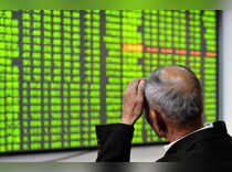 Asian shares hesitant after Wall Street sell-off, dollar buoyant