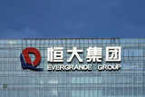 Evergrande services arm shares halve as trading resumes after 16 months