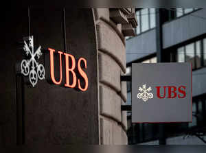 (FILES) Signs of Swiss bank giant UBS bank are seen in Basel on April 4, 2023. The Swiss banking giant UBS has been fined close to $400 million for misconduct by its recently-acquired subsidiary, Credit Suisse, the US Federal Reserve announced on July 24, 2023. Swiss regulators pushed UBS to take over its former rival Credit Suisse earlier this year amid a banking crisis spurred by the collapse of US regional lender Silicon Valley Bank. (Photo by Fabrice COFFRINI / AFP)