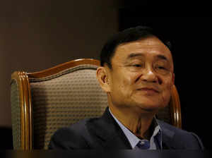 FILE PHOTO: Former Thai Prime Minister Thaksin Shinawatra speaks to Reuters during an interview in Singapore