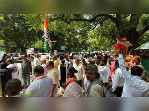 Cong workers celebrate outside party HQ, Kharge says govt should utilise time to work