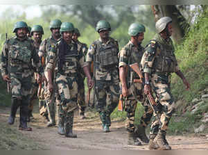 Jammu: BSF personnel patrol near the international border after foiling an infil...
