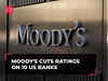 Moody's cuts ratings on 10 US banks; Dow Jones, Nasdaq plunge nearly 1%