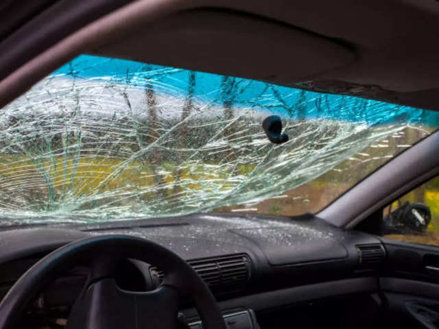 Examine and replace damaged windshield
