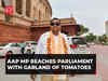 AAP MP Sushil Gupta reaches Parliament with garland of tomatoes to protest against inflation