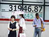 Japan's Nikkei rises on strong earnings; Honda lifts Topix