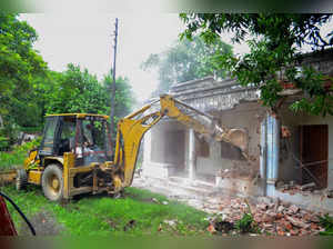 Varanasi: The Sarva Seva Sangh complex being demolished at Rajghat, in Varanasi....