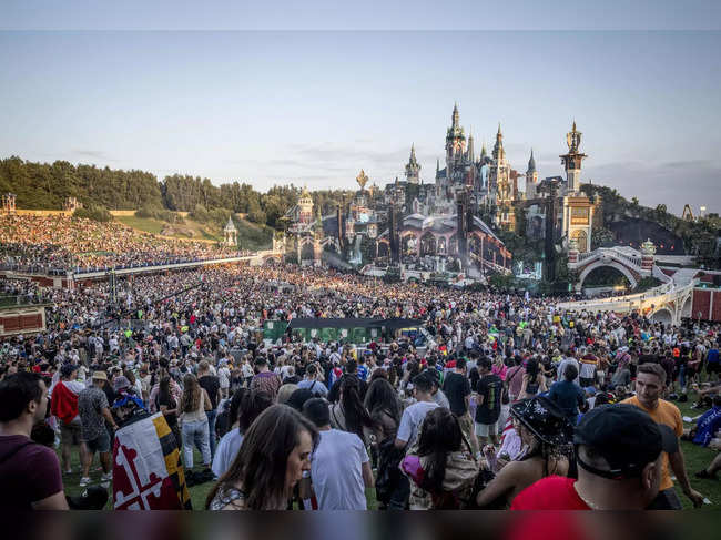 Visitors attend the first day of the Tomorrowland electronic music festival in Boom on July 21, 2023. Belgium OUT (Photo by HATIM KAGHAT / BELGA / AFP)