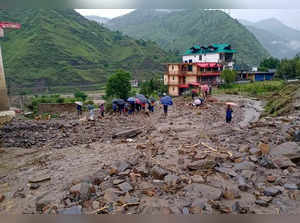 Shimla: A damaged road after a cloudburst at Rohru area in Shimla district. (PTI...