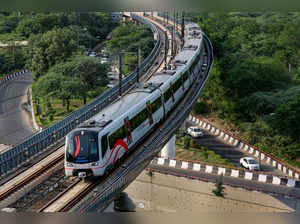 **EDS: IMAGE VIA DMRC** New Delhi: A metro train runs on the Airport Express lin...