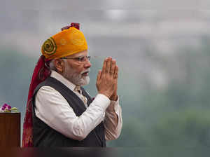 New Delhi: Prime Minister Narendra Modi greets as he arrives to address the nati...