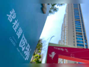 This photo taken on August 14, 2023 shows a logo of China's developer Country Garden Holdings at a housing estate in Zhengzhou, in China's central Henan province. Concerns are mounting in China around Country Garden, a major property developer whose colossal debt raises fear of a bankruptcy that could spell wider economic turbulence, two years after the unravelling of its competitor Evergrande. Country Garden shares plunged by more than 16 percent in Hong Kong on August 14, 2023, after it missed bond payments and warned of multibillion-dollar losses. - China OUT (Photo by AFP)