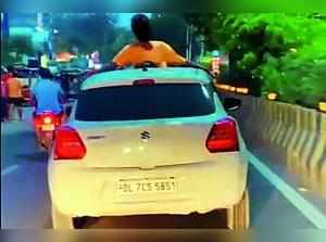 Man performs stunts on moving car roof, fined 26k