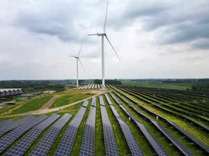 A solar panel park and wind turbines are seen in Geldermalsen