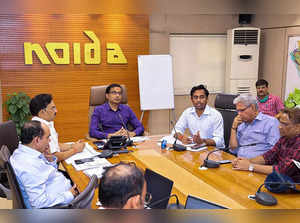 **EDS: TO GO WITH STORY** Noida: Noida Authority CEO Lokesh M chairs a meeting w...