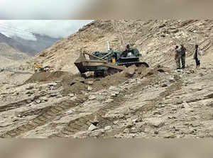 Leh, July 22 (ANI): Restoration work by Indian Army underway in Leh for clearing...