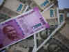 Rupee ends flat, in contrast to peers, on likely RBI intervention