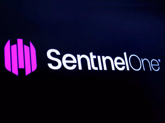 FILE PHOTO: The logo for SentinelOne Inc, a cybersecurity firm, is displayed on a screen during the company’s IPO at the NYSE in New York