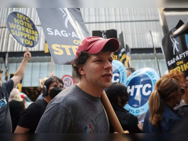 Actor Jessie Eisenberg with SAG-AFTRA and WGA strikers during picket in New York