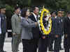 Taiwan's president renews her pledge to stronger self defence during visit to war memorial